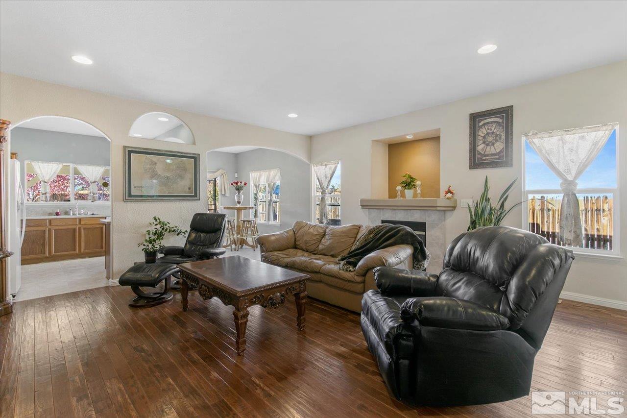 9625 Marble Creek Court Reno, NV 89506 - Photo 8 of 40 a living room with furniture and a wooden floor