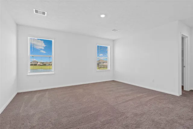 an empty room with windows