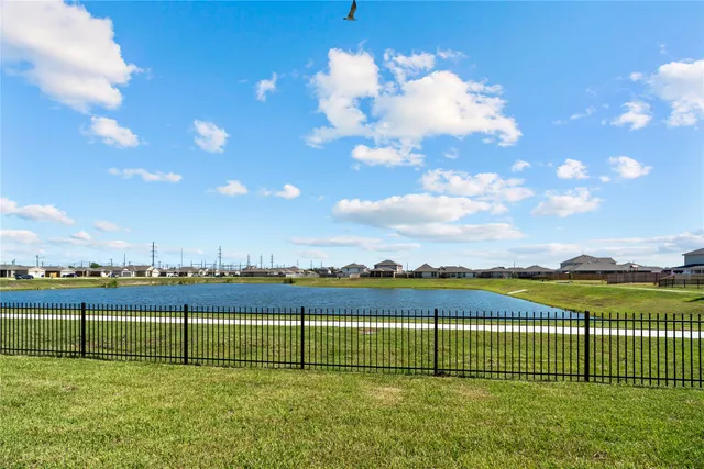 a view of a golf course with a lake