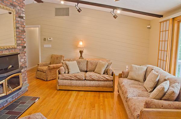 587 Edmands Road Framingham, MA 01701 - Photo 14 of 30 a living room with furniture and a fireplace