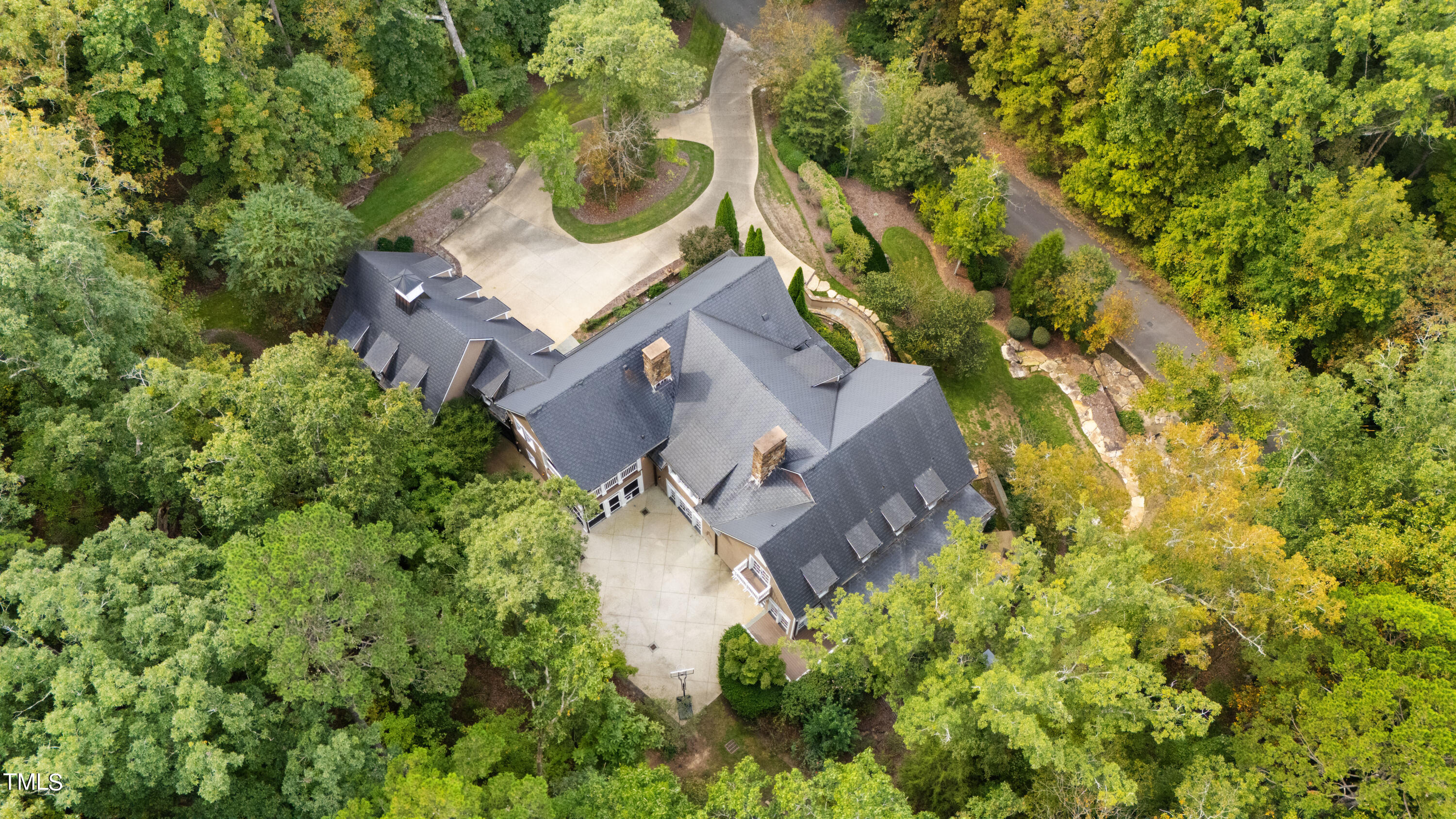 621 Sugarberry Road Chapel Hill, NC 27514 - Photo 4 of 85 an aerial view of a house with swimming pool and garden space