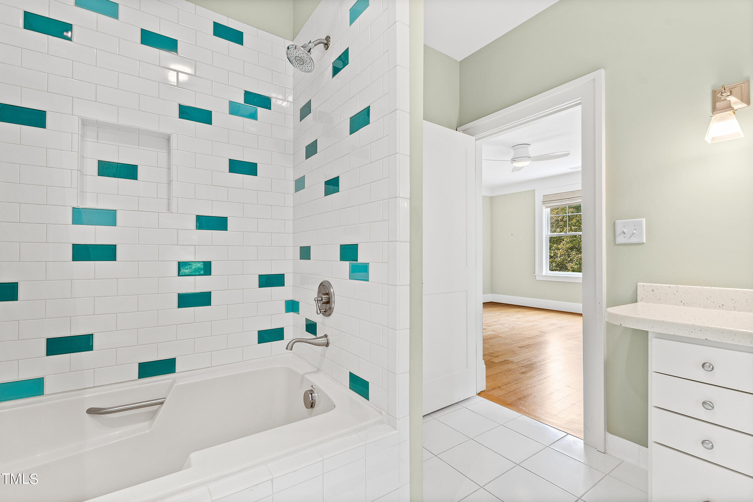 621 Sugarberry Road Chapel Hill, NC 27514 - Photo 44 of 85 a bathroom with a bathtub and a shower