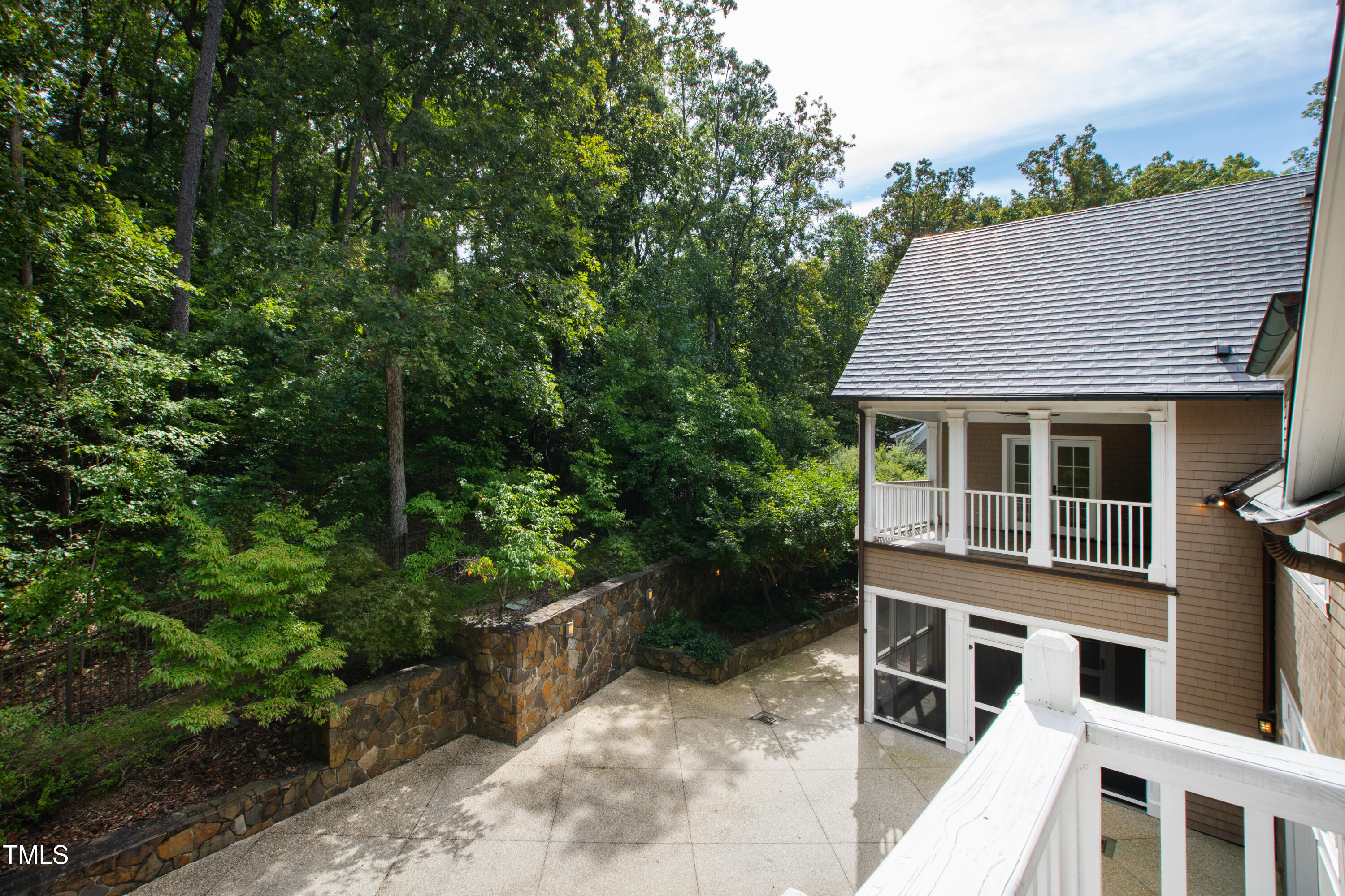 621 Sugarberry Road Chapel Hill, NC 27514 - Photo 49 of 85 a aerial view of a house with a yard and potted plants