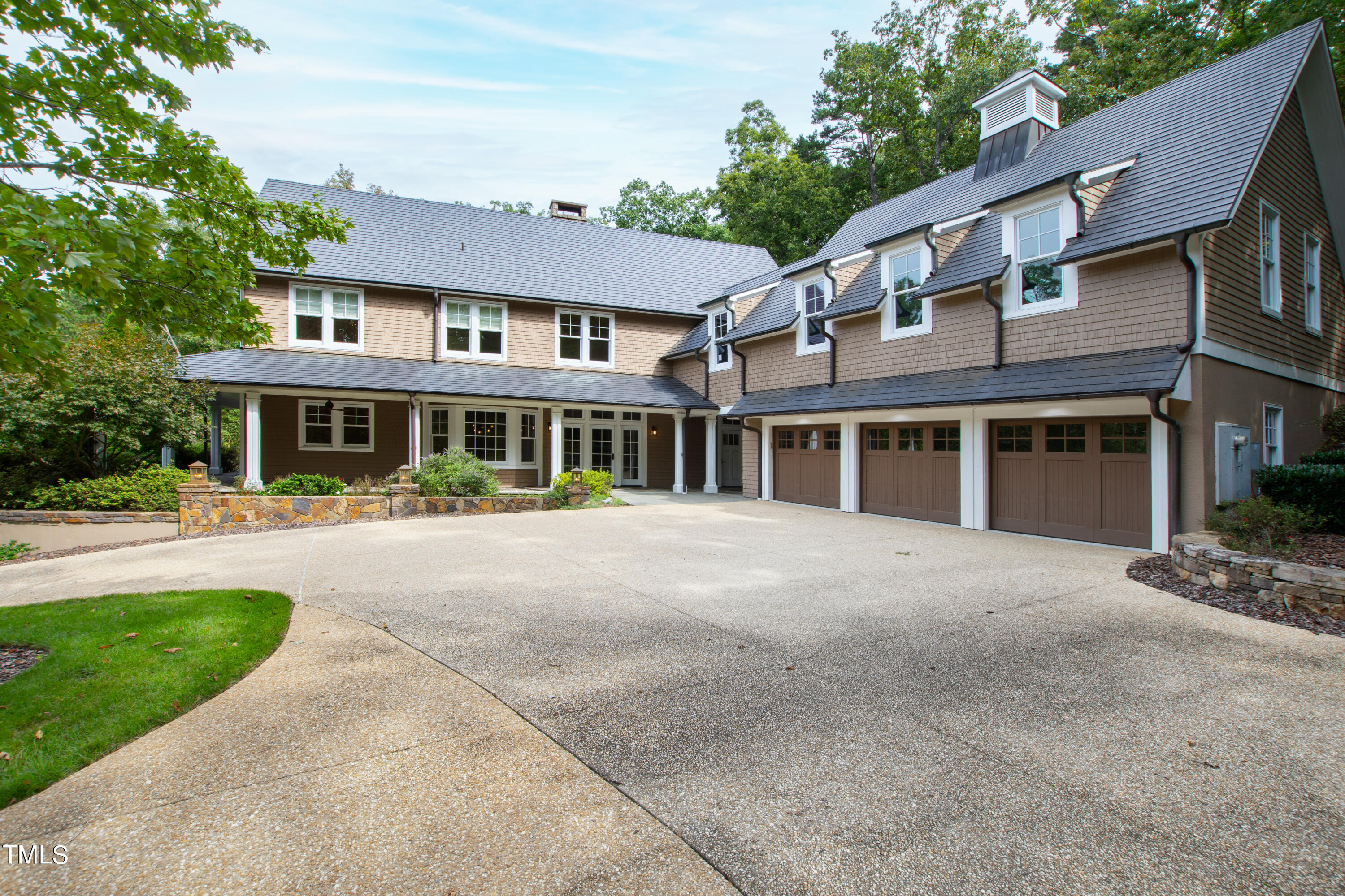 621 Sugarberry Road Chapel Hill, NC 27514 - Photo 5 of 85 a front view of a house with a yard
