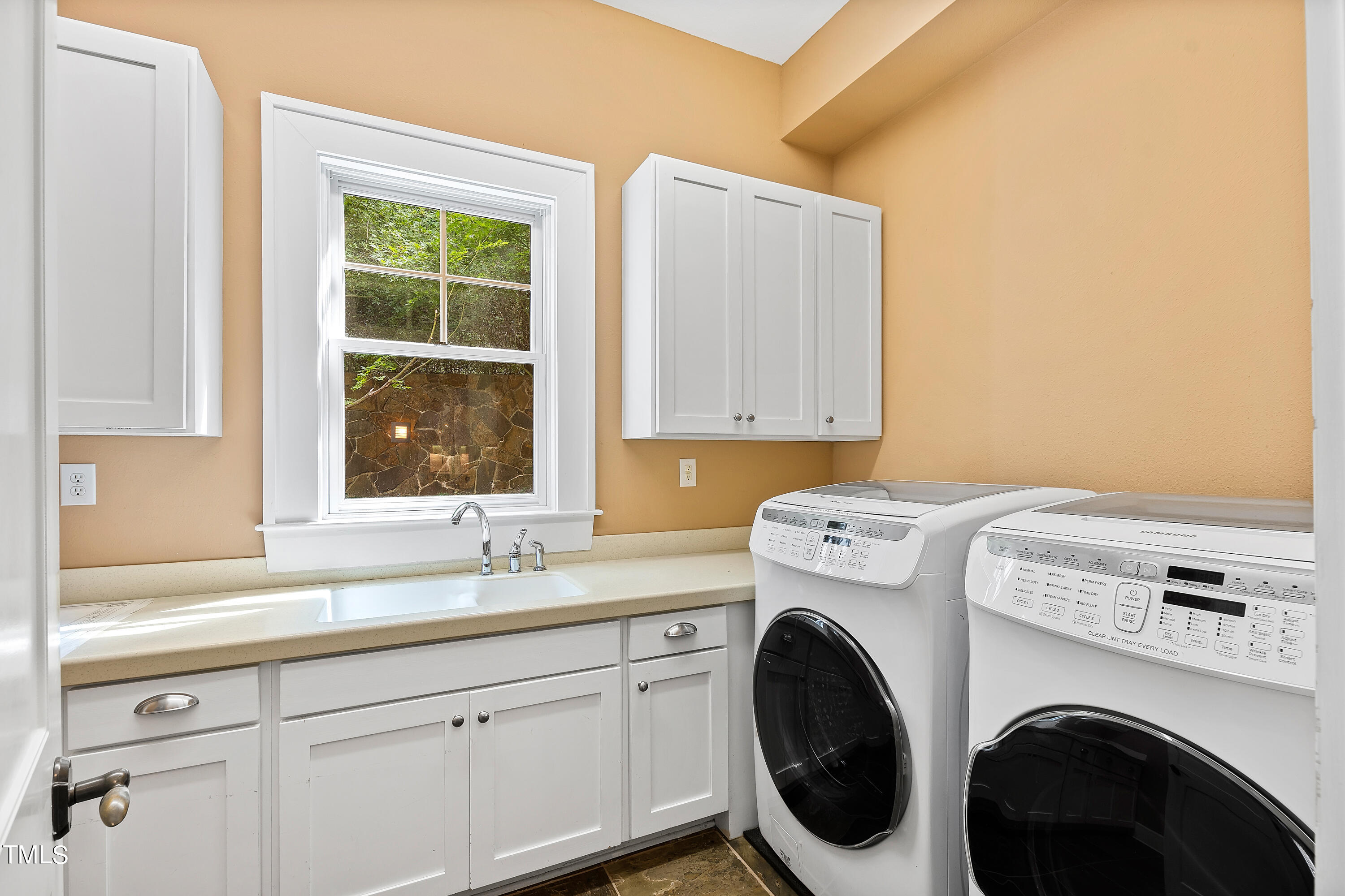 621 Sugarberry Road Chapel Hill, NC 27514 - Photo 62 of 85 a utility room with dryer and washer