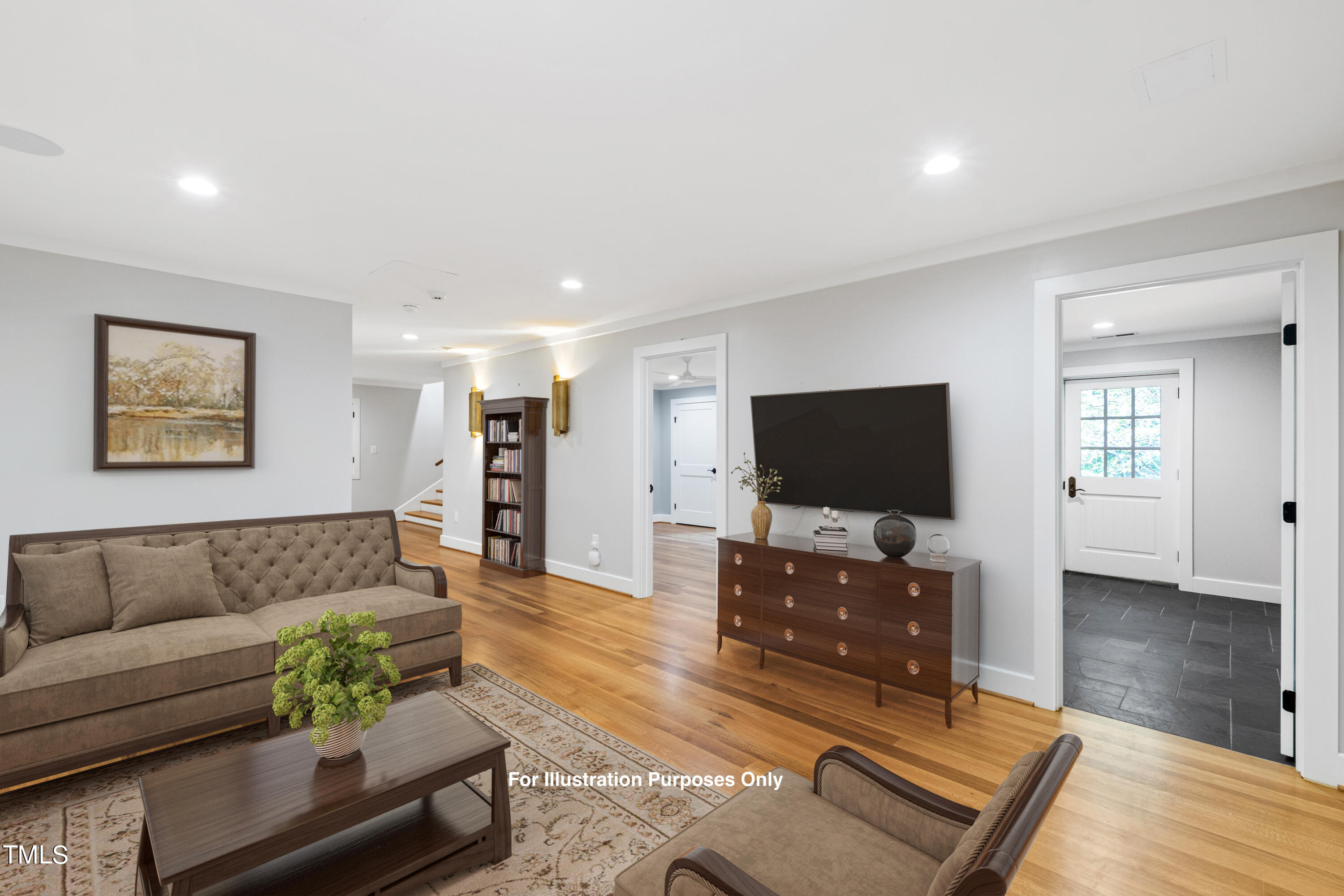 621 Sugarberry Road Chapel Hill, NC 27514 - Photo 67 of 85 a living room with furniture and a flat screen tv