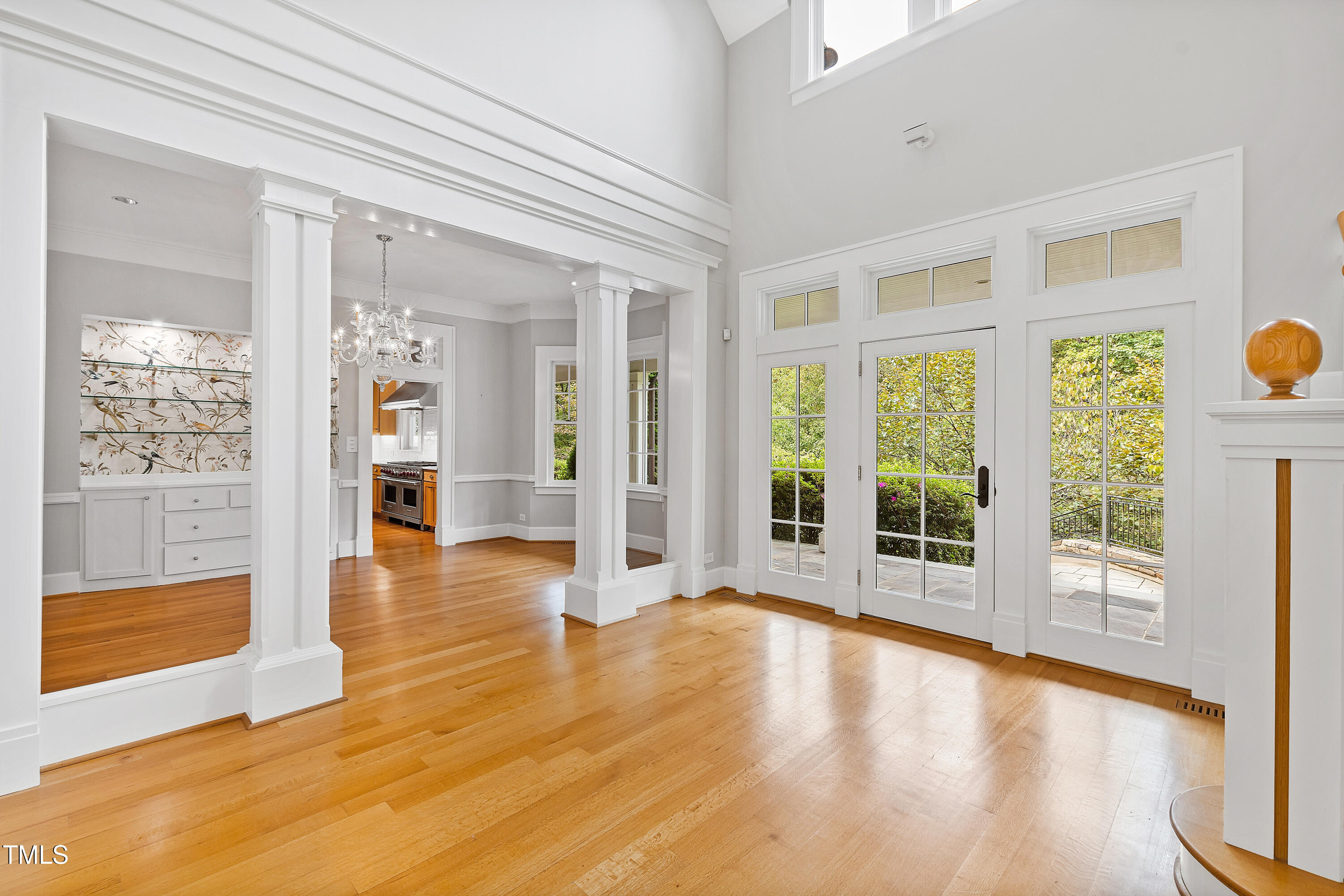 621 Sugarberry Road Chapel Hill, NC 27514 - Photo 8 of 85 a view of an entryway with wooden floor and a yard