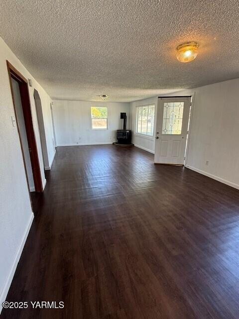 402 Rivard Road South Moxee, WA 98936 - Photo 4 of 9 wooden floor in an empty room with a window