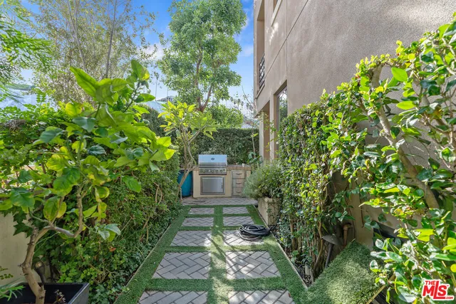 a bathroom with a granite countertop sink mirror and double