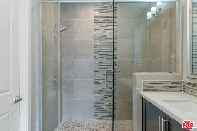 a view of a street with a building in the background