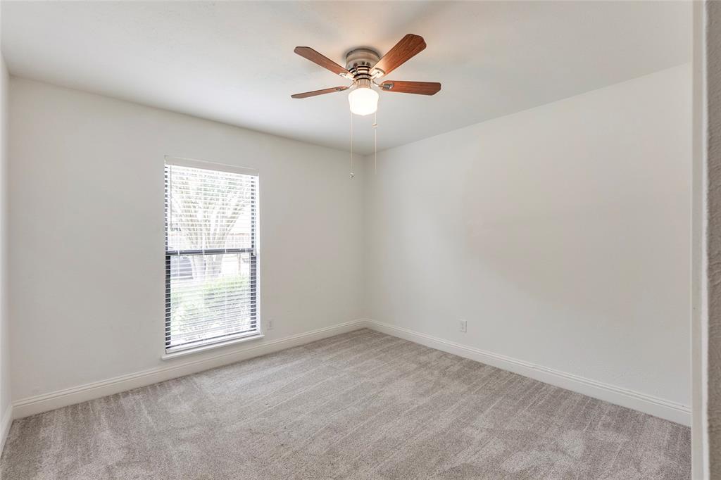 2004 White Ash Road Carrollton, TX 75007 - Photo 21 of 40 Bedroom #1 with Ceiling Fan & Closet
