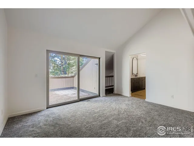 a view of empty room with front door