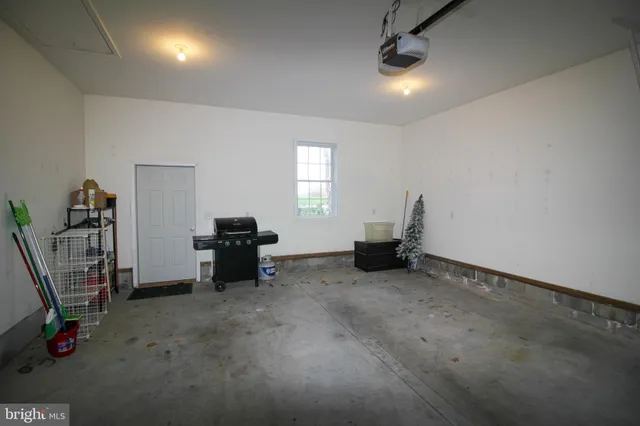 a bedroom with a bed and a cabinets