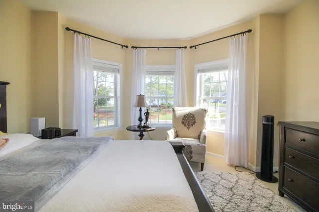 a kitchen with stainless steel appliances granite countertop wooden cabinets a stove top oven a sink and dishwasher