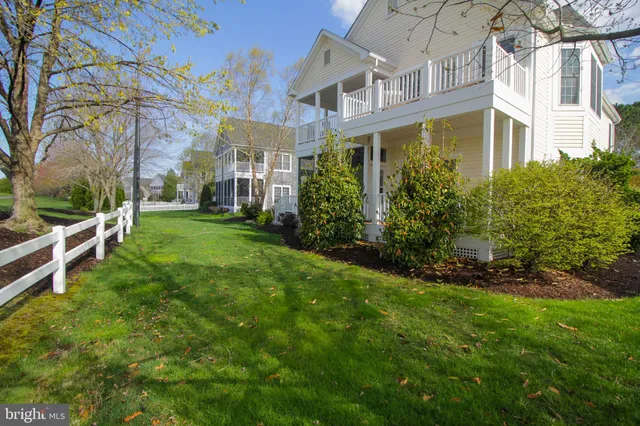 a view of a balcony with furniture