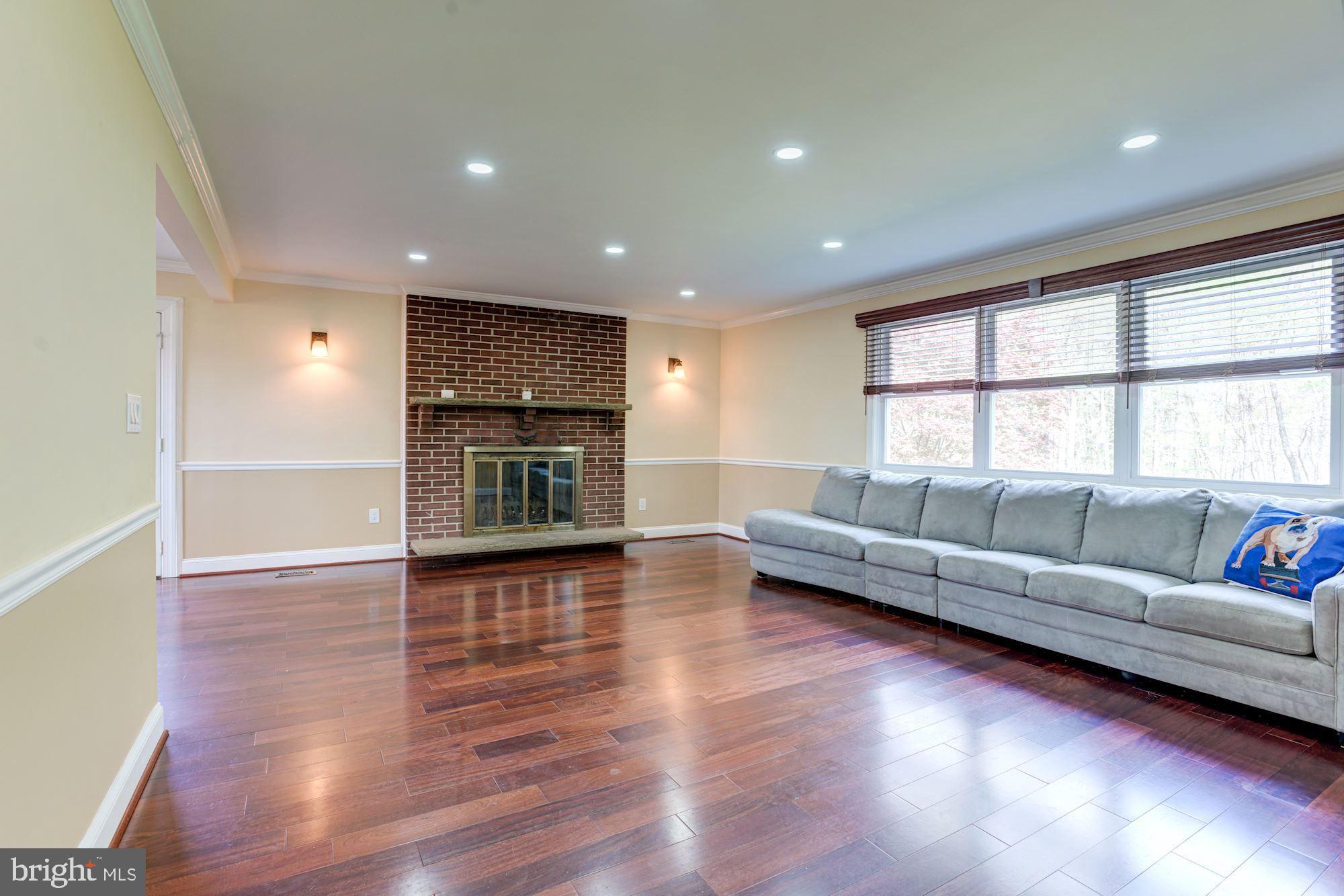 2924 Merrymans Mill Road Phoenix, MD 21131 - Photo 3 of 38 Living Room | Hardwood Floors | Fireplace