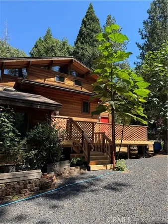 a view of a park with iron fence