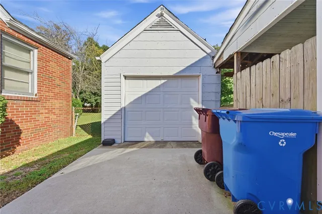a view of backyard with a barn and a cactus plant