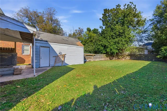 a view of a backyard with a garden