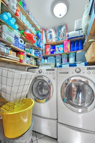 a bedroom with a bed and a table