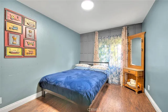 a bedroom with a bed and a closet