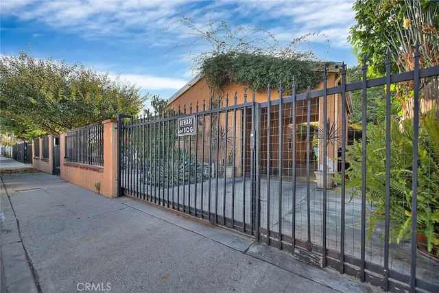 a view of street from balcony