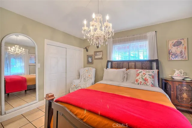 a front view of a house with sitting area