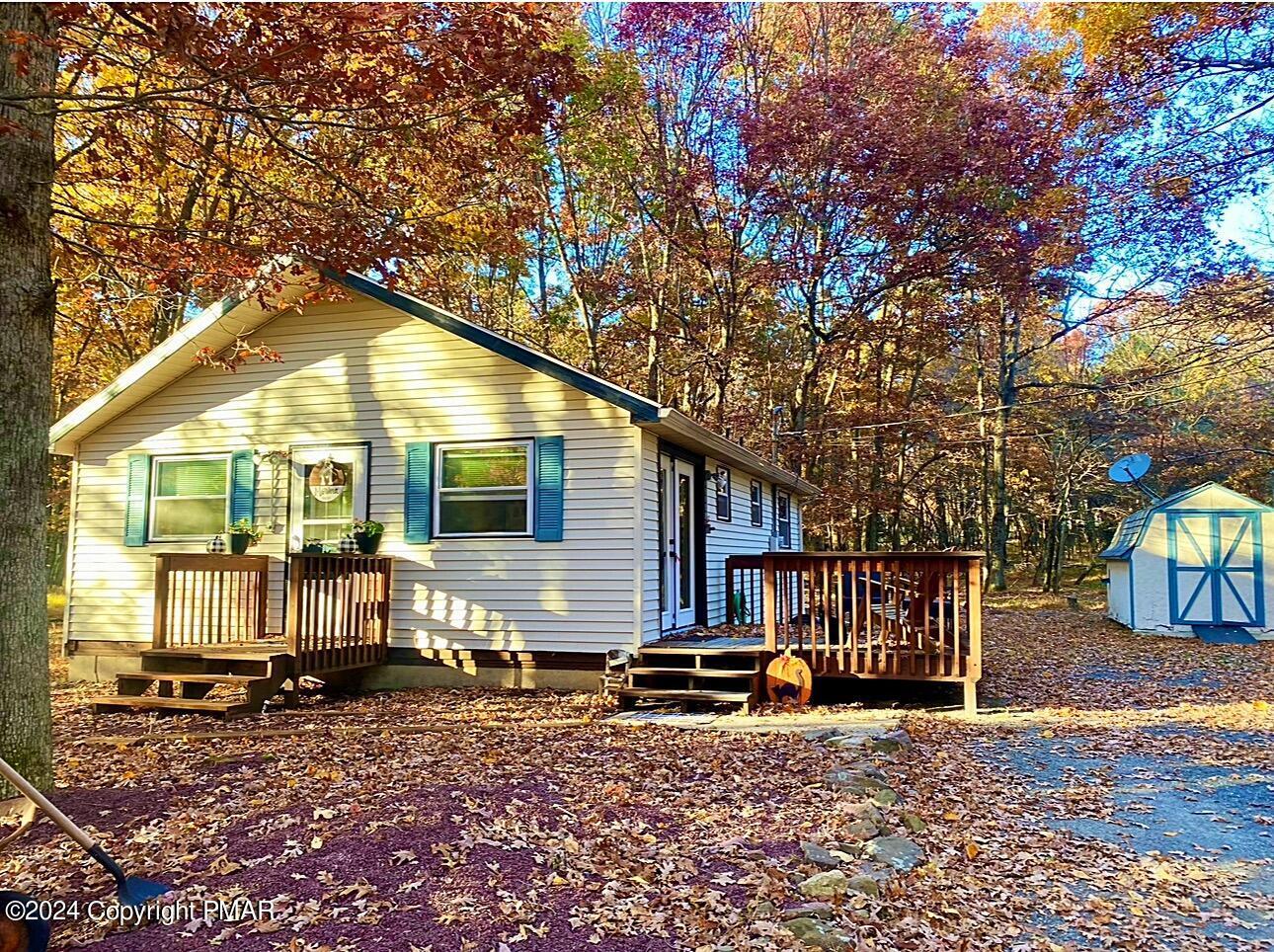 93 Iroquois Road Albrightsville, PA 18210 - Photo 15 of 24 a front view of a house with garden