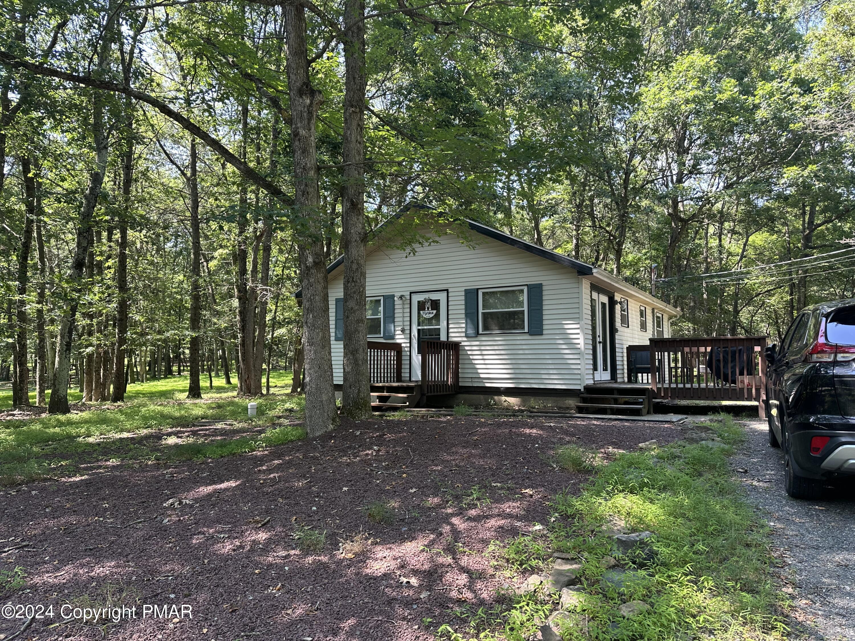 93 Iroquois Road Albrightsville, PA 18210 - Photo 17 of 24 a view of a house with a yard