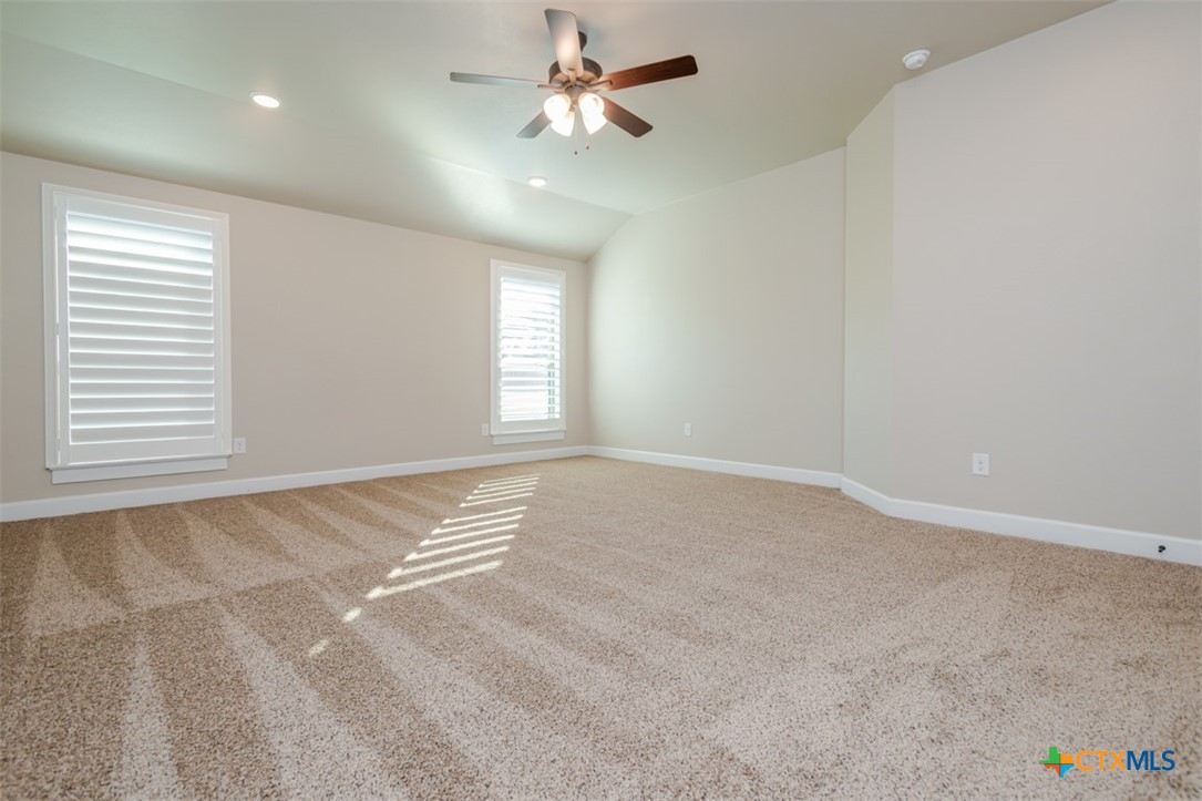 3497 Hooten Bend Kempner, TX 76539 - Photo 26 of 36 an empty room with windows and fan