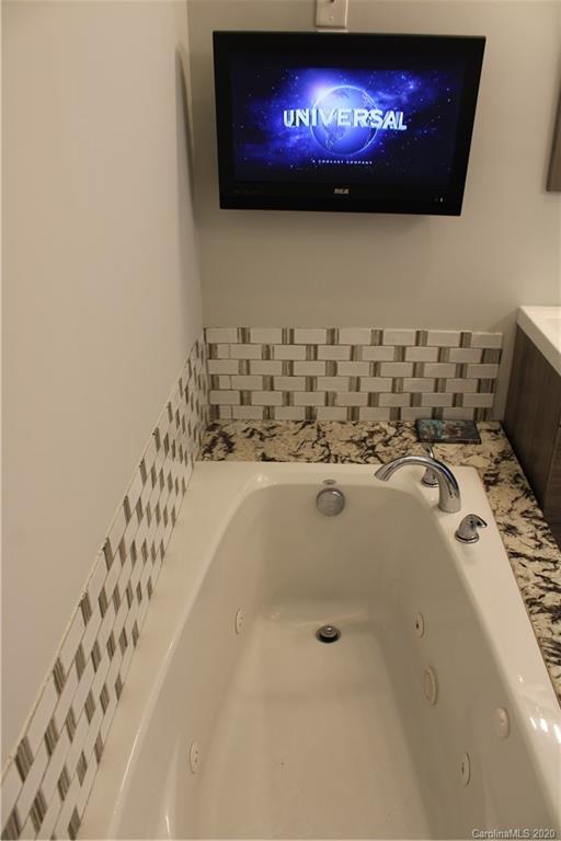 7716 Red Robin Trail Denver, NC 28037 - Photo 15 of 29 a bathroom with a sink and mirror