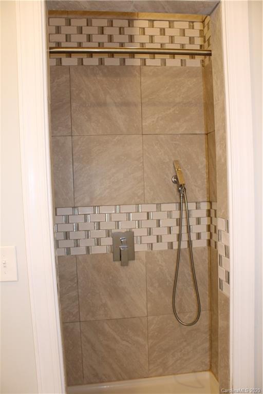 7716 Red Robin Trail Denver, NC 28037 - Photo 19 of 29 a bathroom with a shower