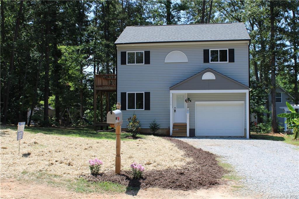7716 Red Robin Trail Denver, NC 28037 - Photo 25 of 29 a front view of a house with a yard