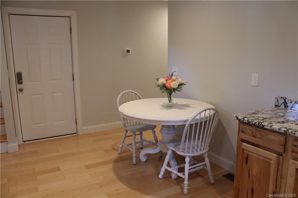 7716 Red Robin Trail Denver, NC 28037 - Photo 27 of 29 a dining room with furniture and wooden floor