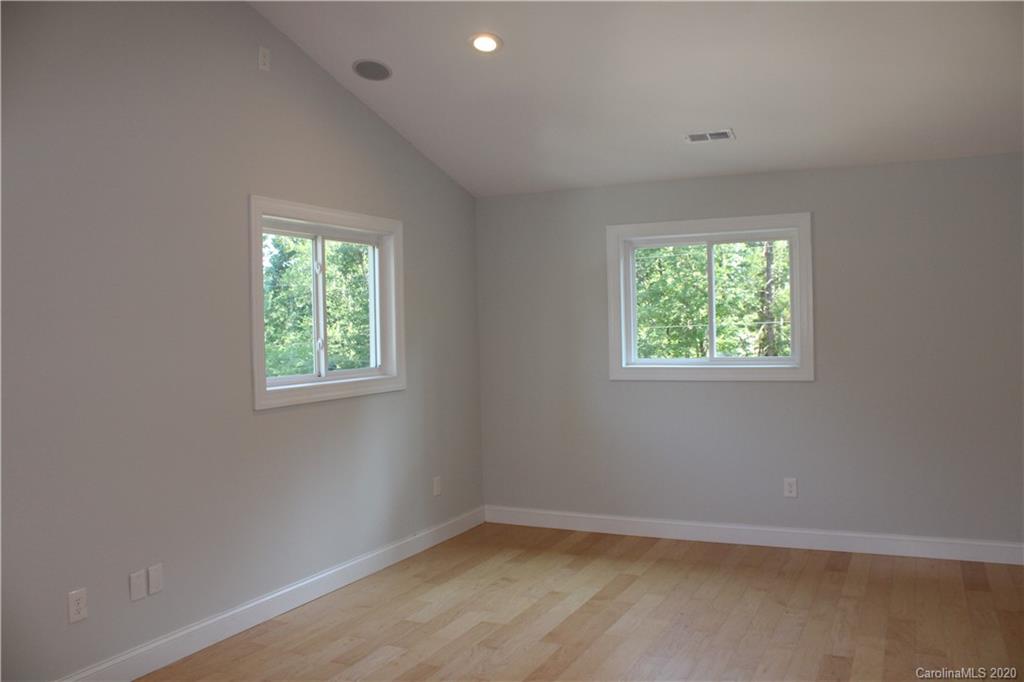 7716 Red Robin Trail Denver, NC 28037 - Photo 7 of 29 an empty room with windows