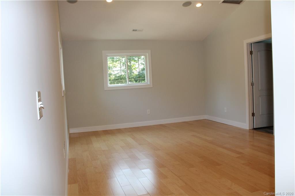 7716 Red Robin Trail Denver, NC 28037 - Photo 9 of 29 an empty room with a window