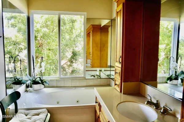 a bedroom with a workspace