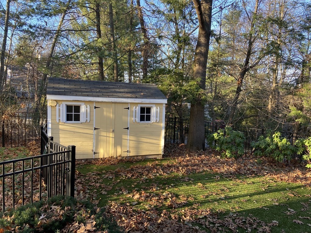 751 Central Avenue Needham, MA 02494 - Photo 20 of 21 a front view of a house with a yard