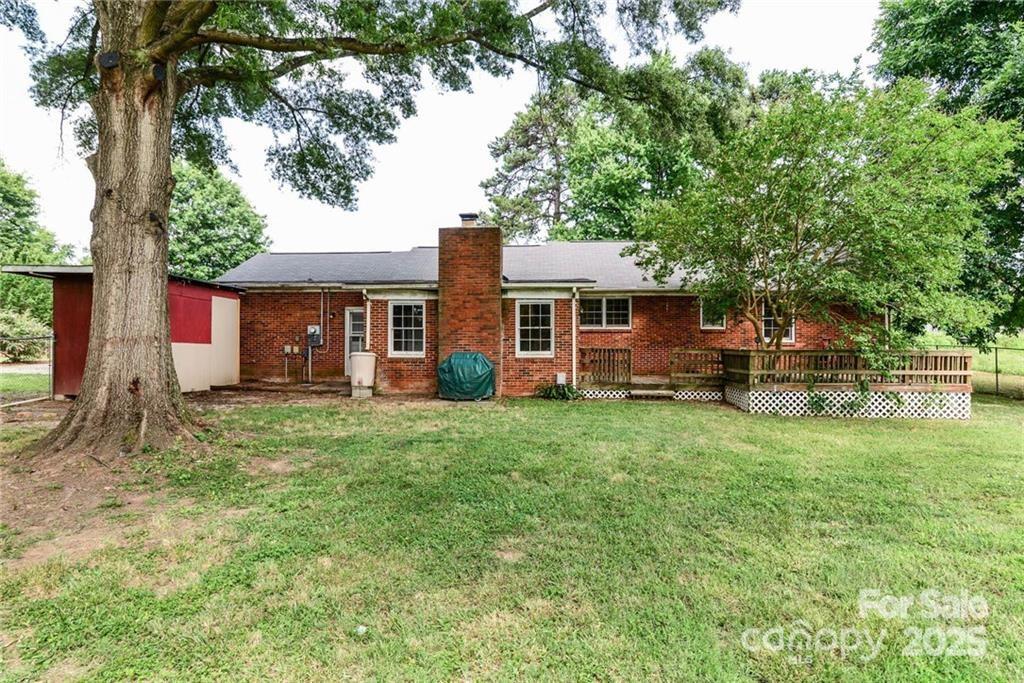 4716 Margaret Wallace Road Matthews, NC 28105 - Photo 2 of 2 front view of a house with a yard