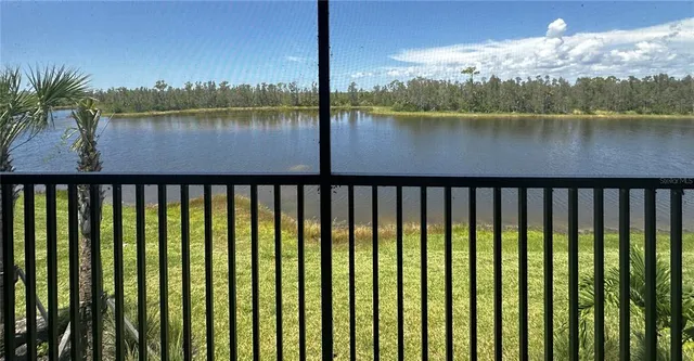 a view of a lake from a balcony