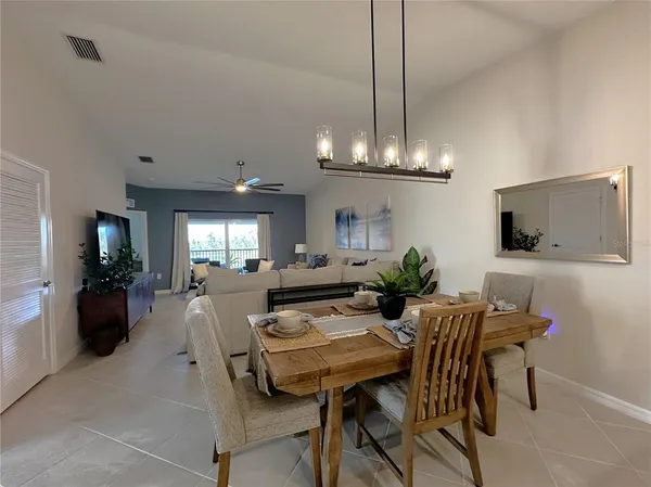 a view of a dining room with furniture