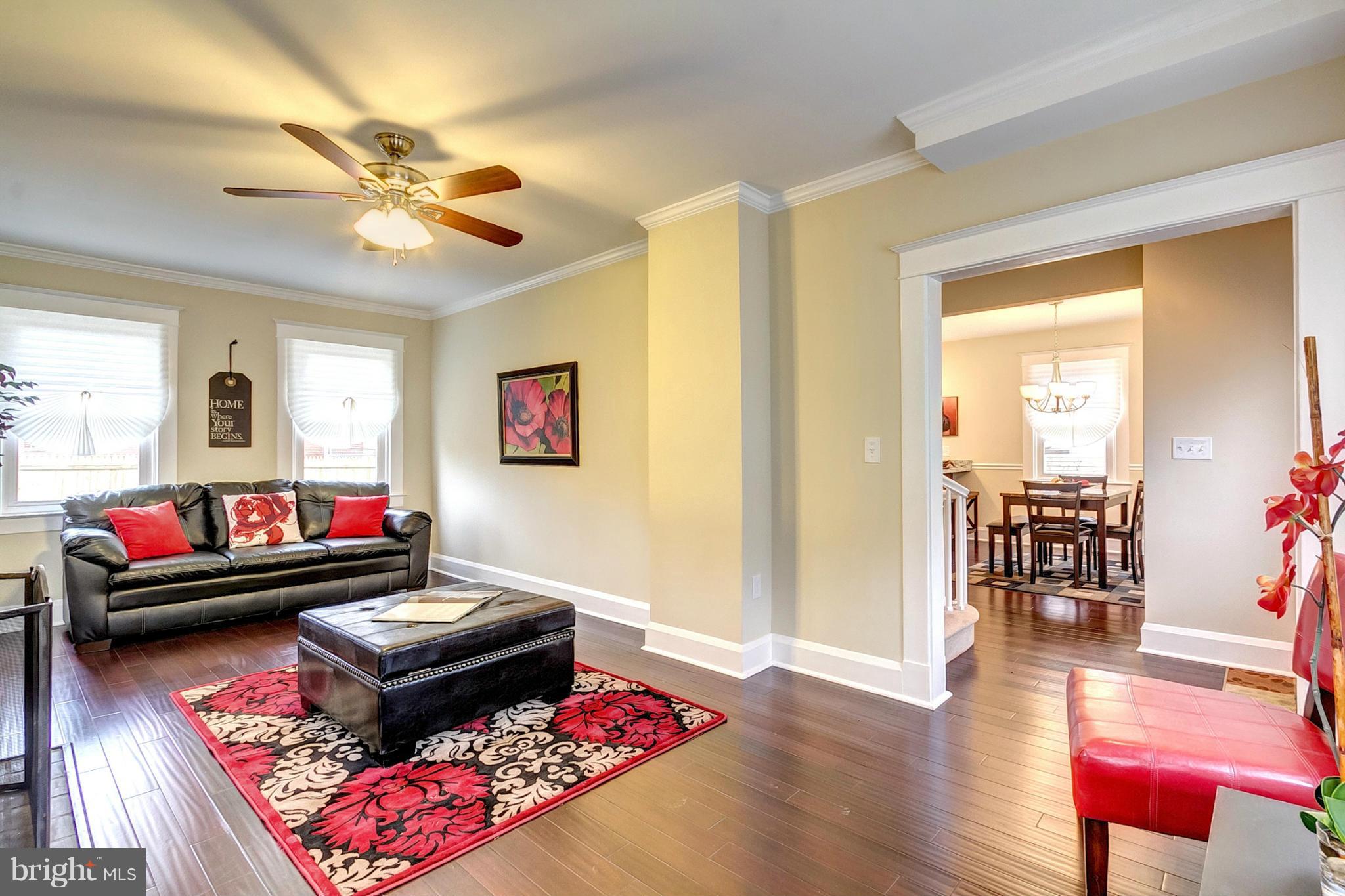 5800 Clearspring Road Baltimore, MD 21212 - Photo 13 of 30 a living room with furniture and wooden floor