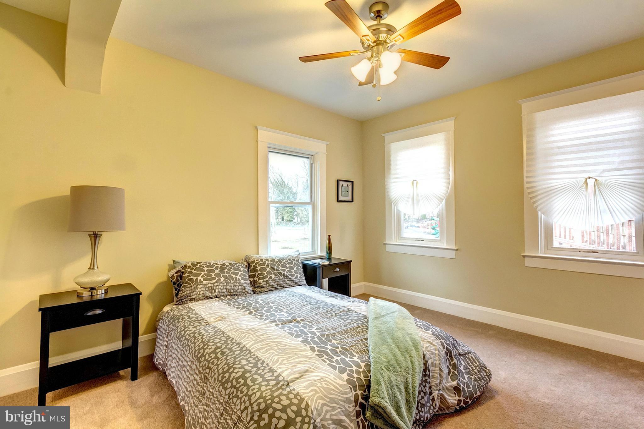 5800 Clearspring Road Baltimore, MD 21212 - Photo 19 of 30 a bedroom with a bed and a window