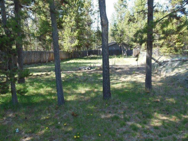 17246 Indio Road Bend, OR 97707 - Photo 21 of 21 a view of a yard with a tree