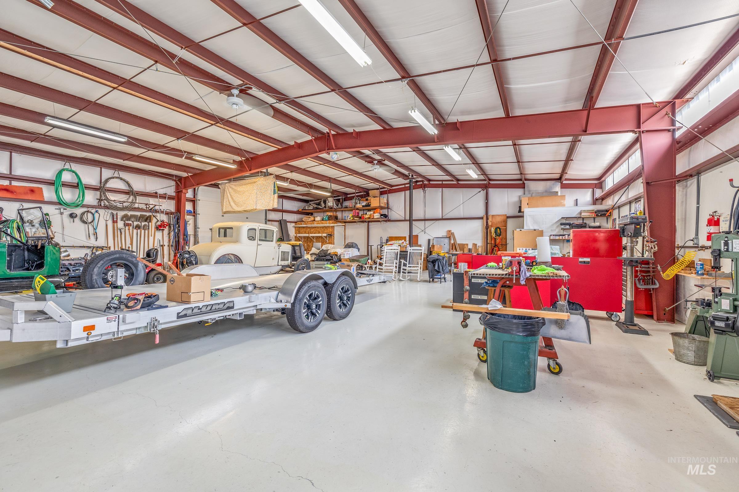 10514 Airpark Loop Road Melba, ID 83641 - Photo 31 of 47 Garage featuring a workshop area