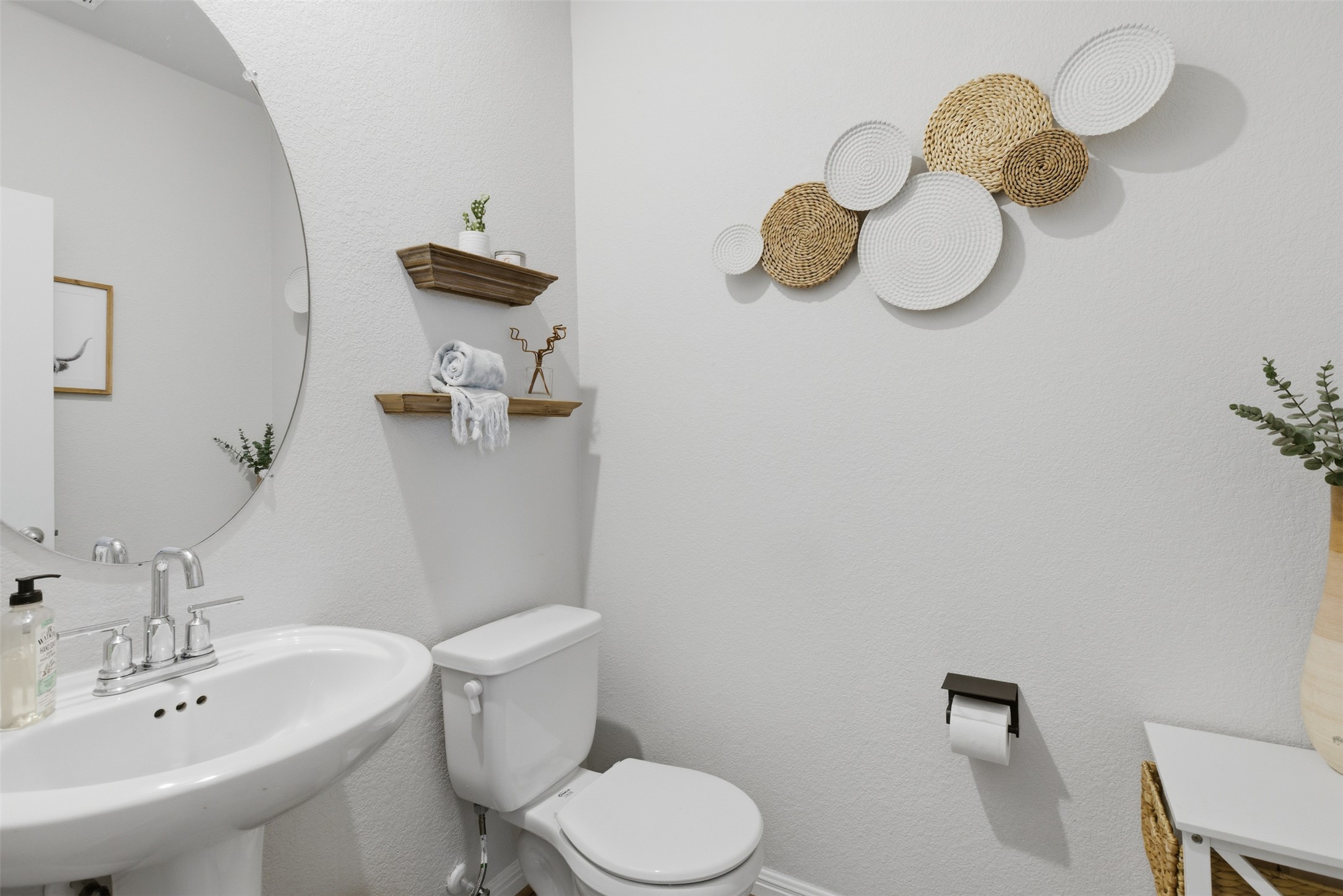 431 Dipprey Lane Georgetown, TX 78628 - Photo 12 of 39 a bathroom with a sink mirror and toilet