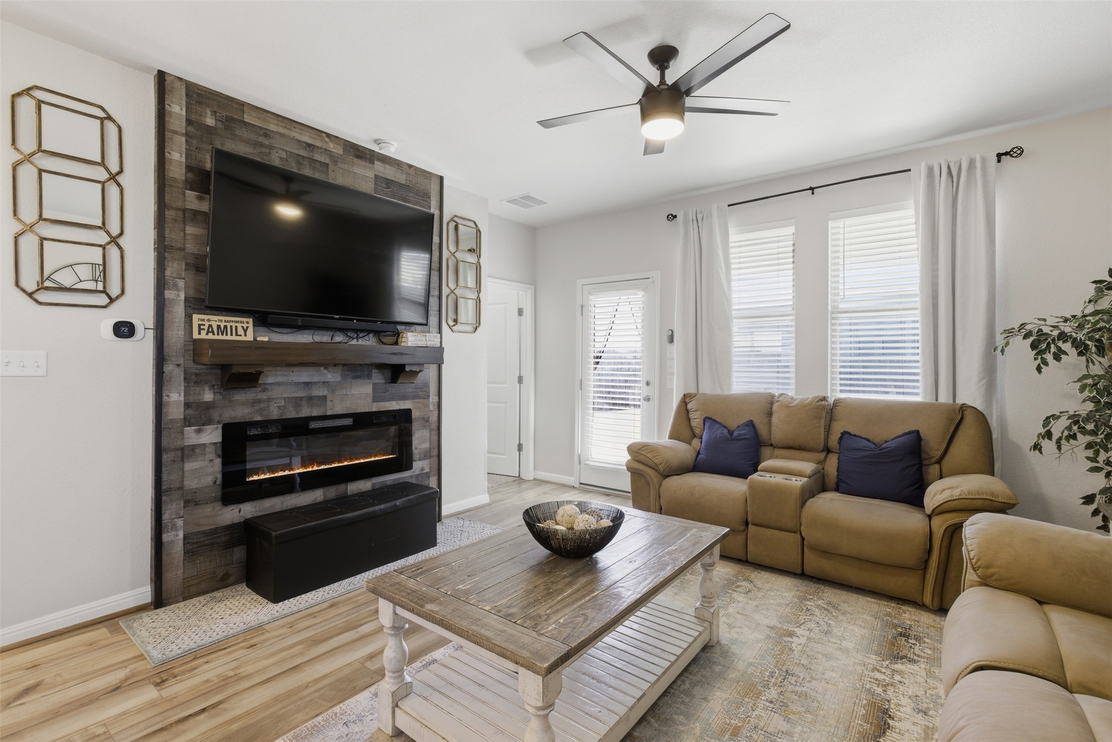 431 Dipprey Lane Georgetown, TX 78628 - Photo 17 of 39 a living room with furniture and a flat screen tv