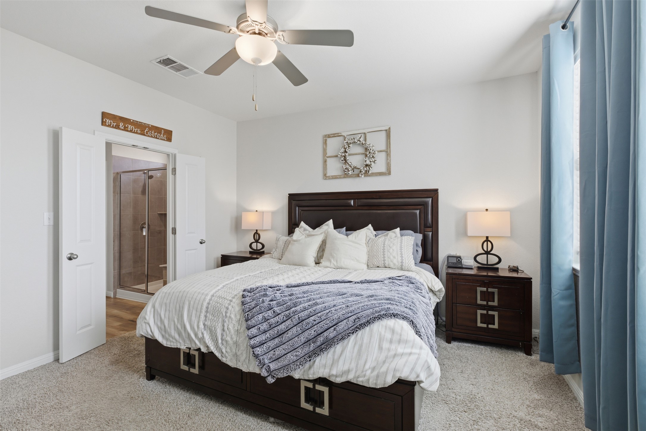 431 Dipprey Lane Georgetown, TX 78628 - Photo 18 of 39 a bedroom with a bed and a night stand