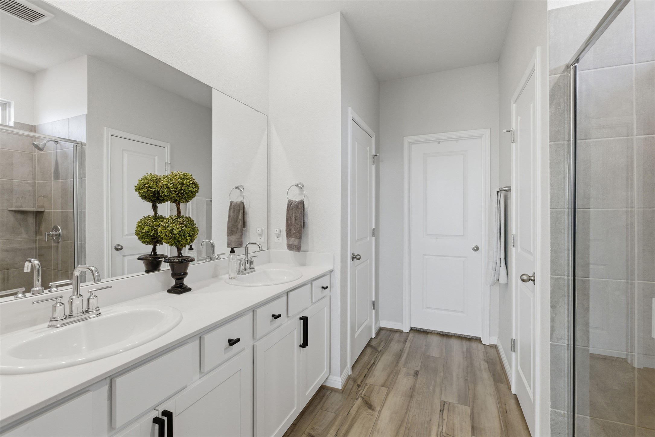 431 Dipprey Lane Georgetown, TX 78628 - Photo 23 of 39 a bathroom with a double vanity sink and mirror