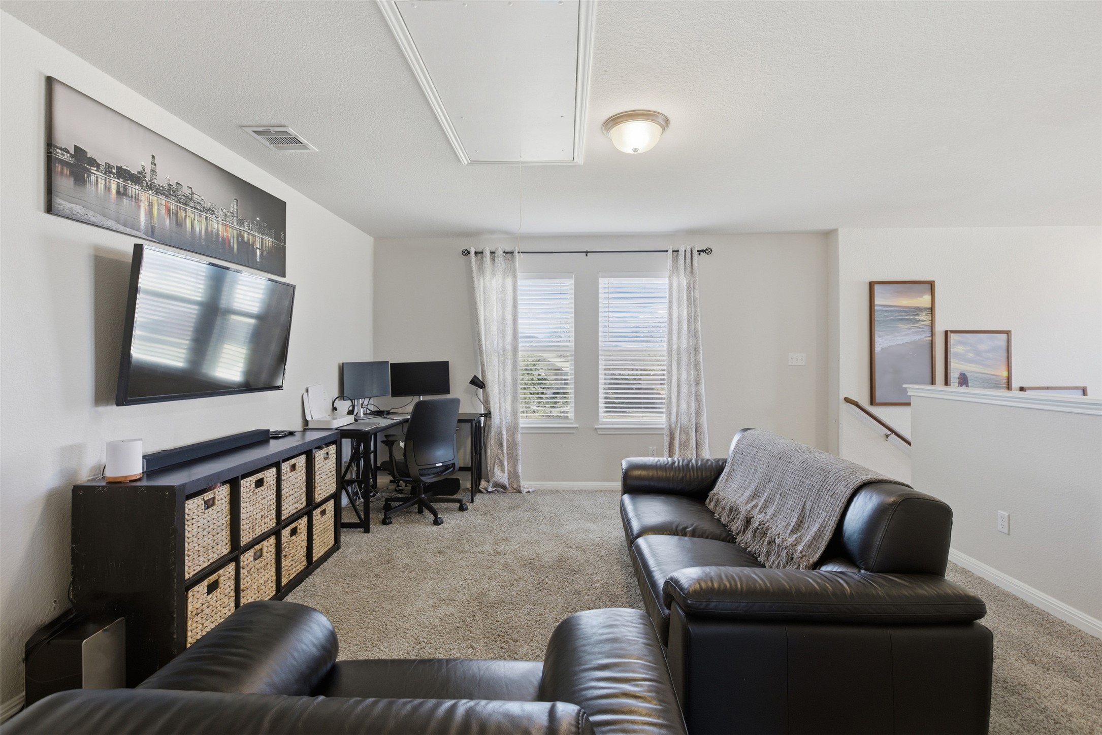 431 Dipprey Lane Georgetown, TX 78628 - Photo 28 of 39 a living room with furniture and a flat screen tv